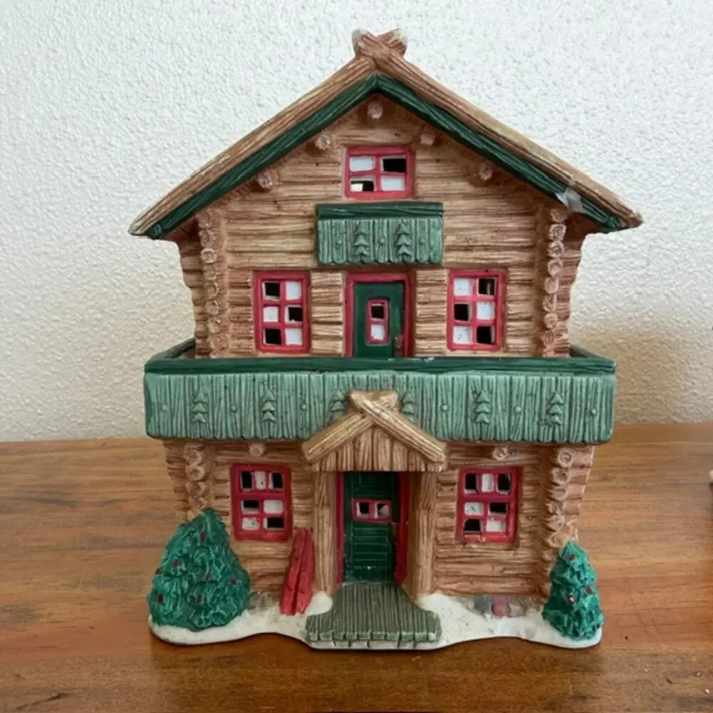 Seasonal Specialties Outfitters Shop and Christmas Village Log Cabin